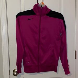nike hoodie, collar and zipper work, no damage, it is a medium in a dark purple.